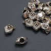 Mărgea «Leu» în stil Pandora, diametrul 12,5×8 mm, diametrul găurii 4 mm, ambalaj 20 g, 15 bucăți (+ -)