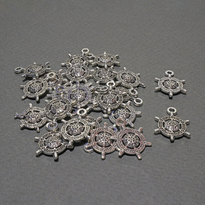 Pandantiv Volan, diametrul 13,5×18,5 mm ± ambalare 23 bucăți ± 20 g