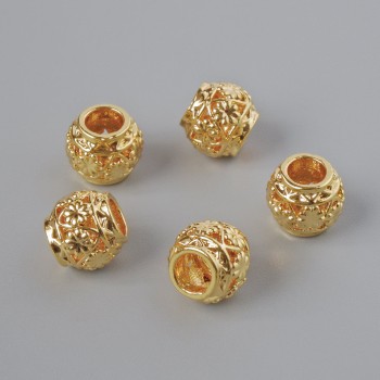 Furnitură – mărgea-inserație, diametrul 6x7 mm, gaură de 3,3 mm, culoare aurie a metalului, 1 bucată