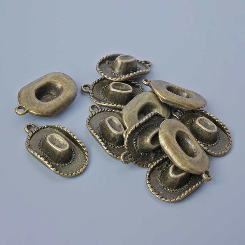 Furnitură pandantiv „Pălărie”, diametru 22×13, 5×5 mm, diametrul găurii 1,8 mm, ambalaj 11 buc. +/- culoare bronz a metalului