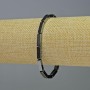 Brățară din hematit, formă dreptunghiulară, culoare neagră, dimensiuni aproximative 12×5×4 mm, lungime 18 cm, elastică