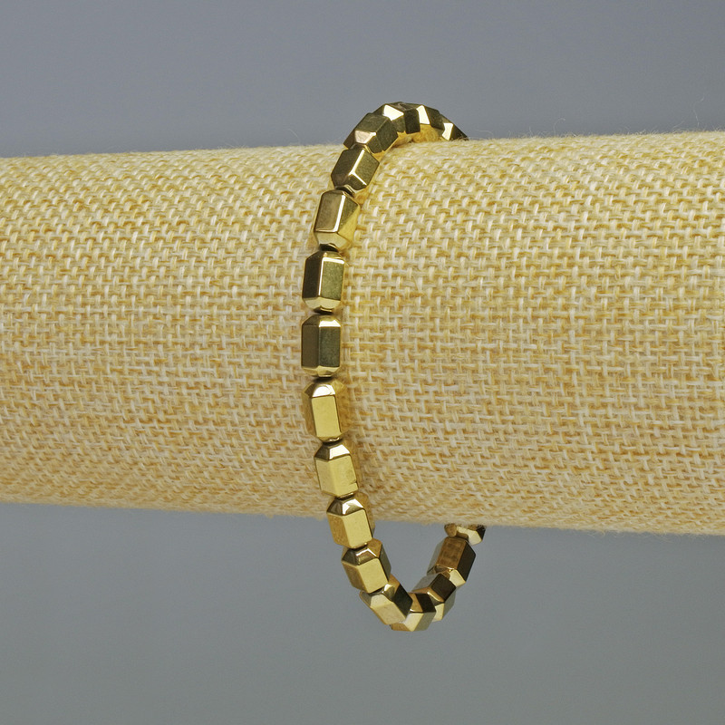 Brățară din hematit cu hexagoane aurii, diametrul 5×8 mm, lungime 18 cm, extensibilă