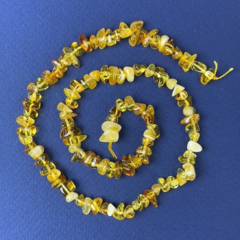 Mărgele din chihlimbar – fragmă 7x4 mm, pe șnur, lungime 38 cm+