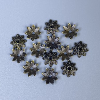 Capace pentru mărgele, culoare bronz, diametru 7×0,5 mm, gaură 0,5 mm, ambalaj 70 buc