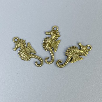 Pandantiv hipocamp bronz, dimensiuni 29x12x2 mm ±, gaură Ø 2 mm ±, ambalare 11 buc.