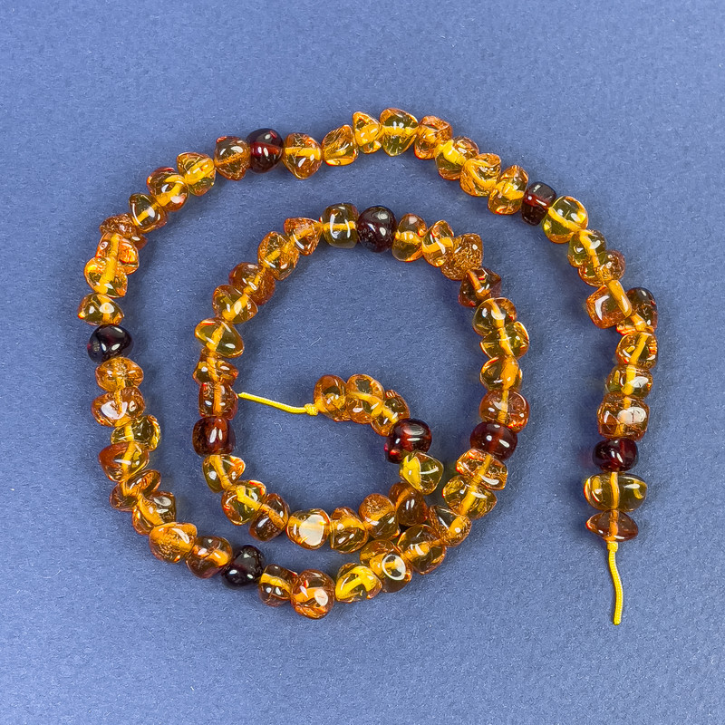 Mărgele de chihlimbar, formă butoi 6x4 mm, pe șnur, lungime 39 cm+