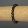 Brățară din bronzit cu mărgele netede, diametrul 8 mm, lungime aproximativă 18 cm, pe bază elastică