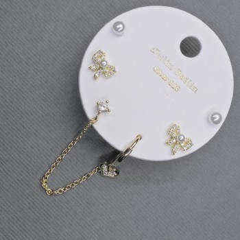 Сережки Пусети з кафом на вушко золотистий метал білі стрази