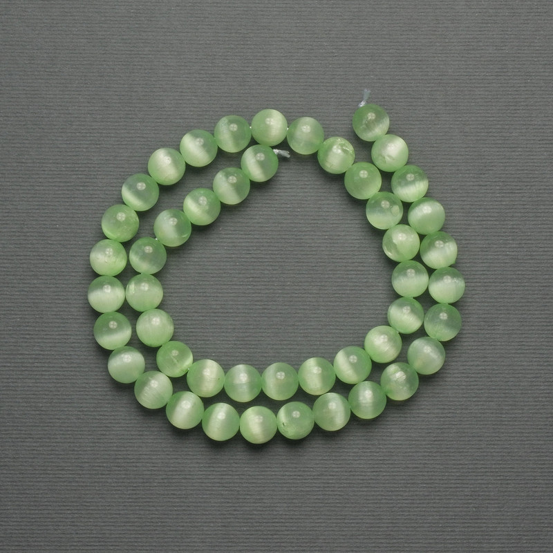 Mărgele Ochi de Pisică în nuanță verde salată, din piatră sintetică, sferice netede, diametrul 8 mm +/- pe șnur, lungime 39 cm+