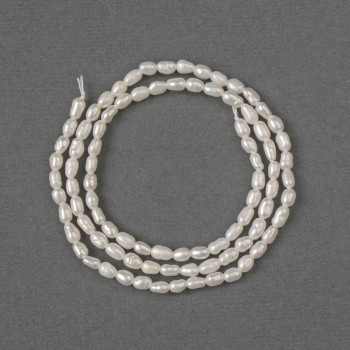 Mărgele din perle de râu naturale 3,5–4×3 mm, pe șnur, lungime 36 cm