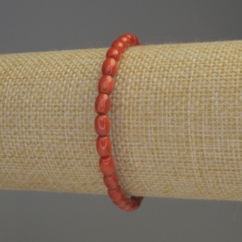Brățară din coral portocaliu, formă baril, diametrul 6x5 mm, lungime 18 cm, pe elastic