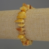 Brățară din fragmente de chihlimbar 8-13×4-5 mm, cu mărgele de 3 mm, lungime 18 cm, pe bază elastică