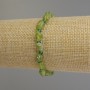 Bratara cu crizolit taiat, diametrul 7-9x6 mm +-; crizoprasa taiata rondel 3,5x3 mm +-; lungime aproximativa 18 cm, pe elastic