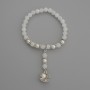 Brățară din cuarț alb, bile netede, diametrul de 6 mm ±, cu inserții metalice, lungime 18 cm ±, pe elastic