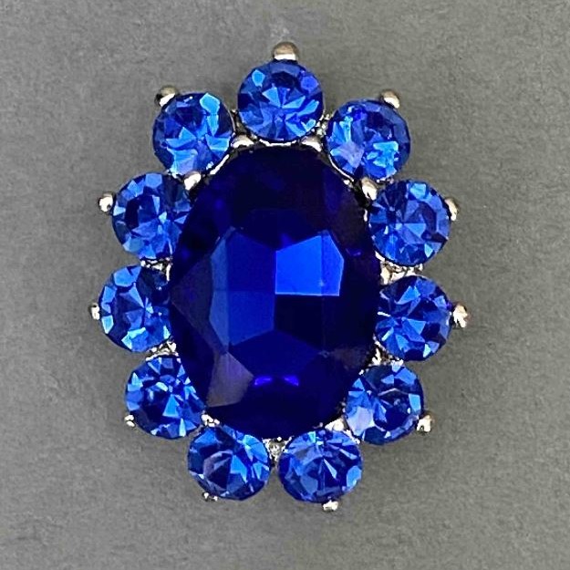 Broșă Accent cu cristal albastru, strasuri, metal argintiu 30x24 mm+