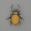 Broșă-pandantiv în formă de gândac, chihlimbar artificial, 44x37 mm, metal argintiu