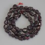 Mărgele din granat tăiate la fațete, diametru 5-8x5-7 mm, lungime 41 cm, pe șnur