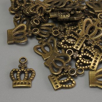 Pandantiv Coroană, culoare bronz, dimensiuni 15×10×1 mm, gaură Ø 2 mm, ambalaj 20 g (~36 buc.)