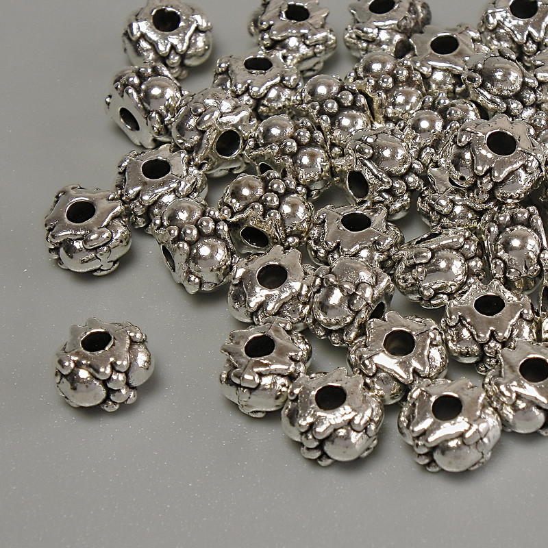 Mărgelă-inserție argintie, dimensiuni 5,5×4 mm, gaură 1,9 mm, ambalare 20 g (~41 buc.)