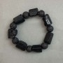 Brățară cu turmalin Sherl, piatră neprelucrată, tăiată, diametrul 19–27×15 mm ±, mărgele de lavă 12 mm ±, lungime 20 mm ±, pe elastic