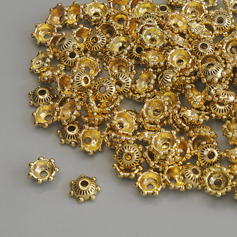 Capace pentru mărgele, culoare aurie, diametru 5,5×1 mm, cu gaură de 1,3 mm, ambalare 20 g (~143 buc.)