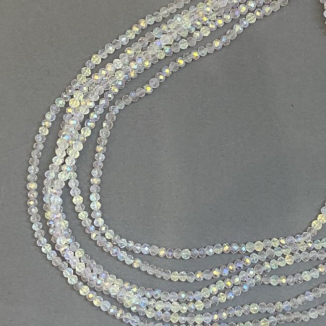 Mărgele Czech Crystal pe fir, alb transparent, cu luciu de benzină, rondelle tăiate, diametrul 3,5x3 mm, lungime 33 cm +