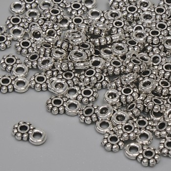 Pandantiv culoare argintie, diametru 7×4,5 mm, gaură pentru cercei de 1,5 mm, ambalaj 84 buc