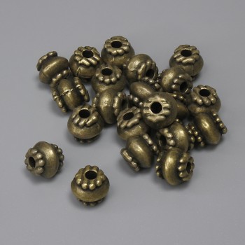 Furnitură mărgea-inserție, culoare bronz, diametru 6×7 mm ±, gaură 2,2 mm ±, ambalaj 22 buc.