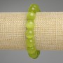 Brățară din ochi de pisică în nuanță măslinie, bile netede, diametru 11,5 mm, lungime 18 cm, șnur elastic