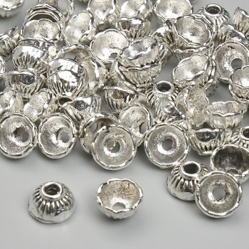 Capace pentru mărgele, diametru 4x7 mm, gaură 2,3 mm, culoare argintiu metal, ambalaj 20 g (~63 buc.)