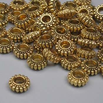 Furnitură pentru mărgele inserții aurii, culoare metal aurie, diametru 7×3 mm, gaură aproximativă 2,8 mm, ambalaj 20 g (~41 buc.)