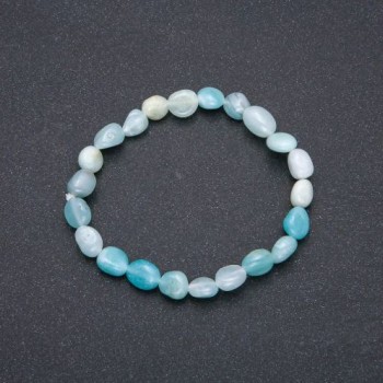 Brățară din acvamarin natural pe elastic cu finisaj galvanic, diametrul 7x9 mm (±), circumferința 18 cm