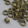 Inserție pentru mărgele, culoare bronz, diametru 7,5×3 mm, gaură 5 mm ±, ambalare ~38 buc.