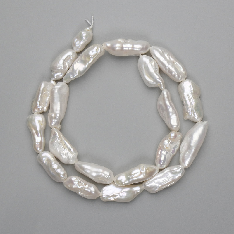 Perle baroce cu nuanță petrol, 16-23×7-8 mm, +- lungimea șnurului 38 cm+
