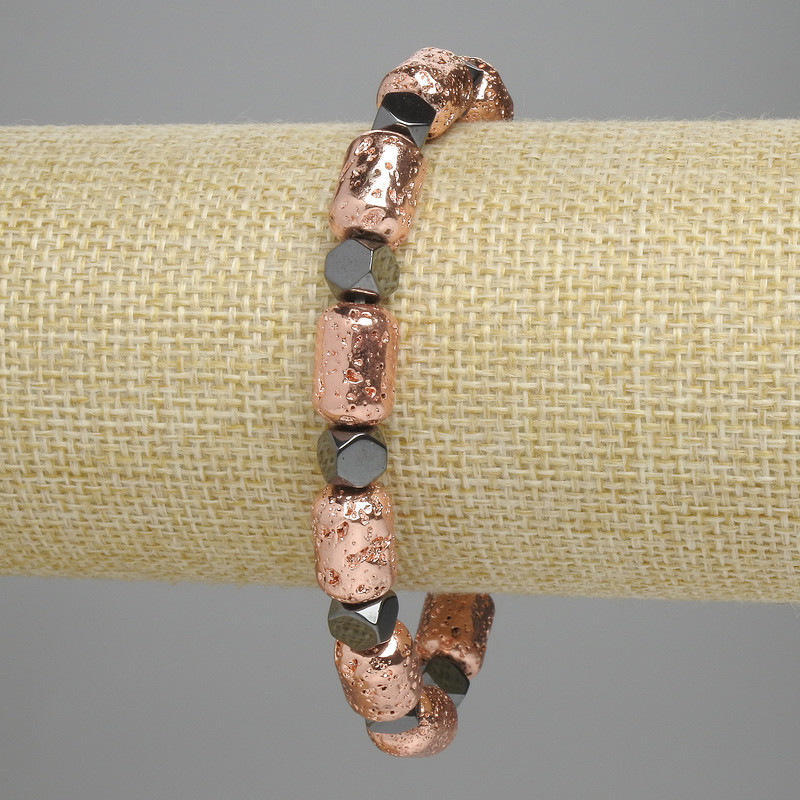 Brățară din lavă cilindrică, nuanță cupru, 12×8 mm; hematit multifacetat 5,5×6 mm; lungime 18 cm, elastic