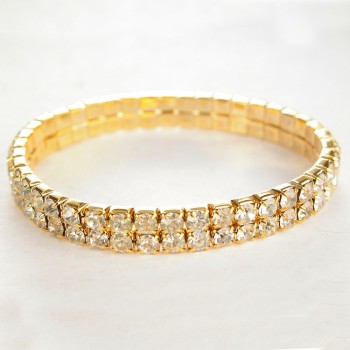 Brățară de ocazie cu două rânduri, pe elastic, strasuri albe, metal auriu, circumferința de 17 cm