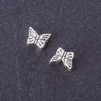 Furnitură mărgea-inserție «Fluture» culoare argintie, dimensiuni 7×9 mm, ambalaj 20 g ± 33 buc.