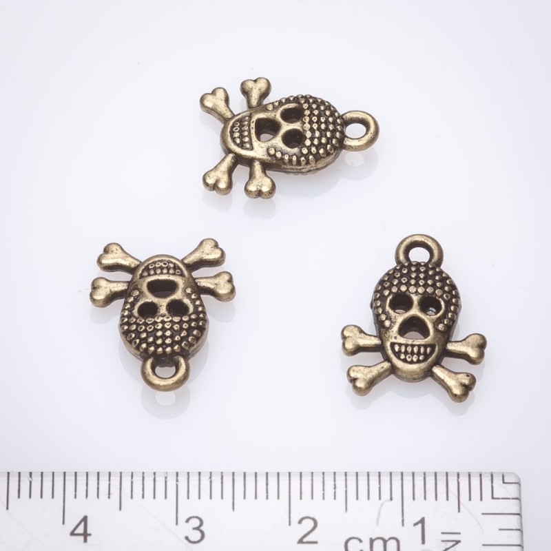 Furnitură pandantiv craniu 13x17 mm bronz fason 20 g ± 13 buc