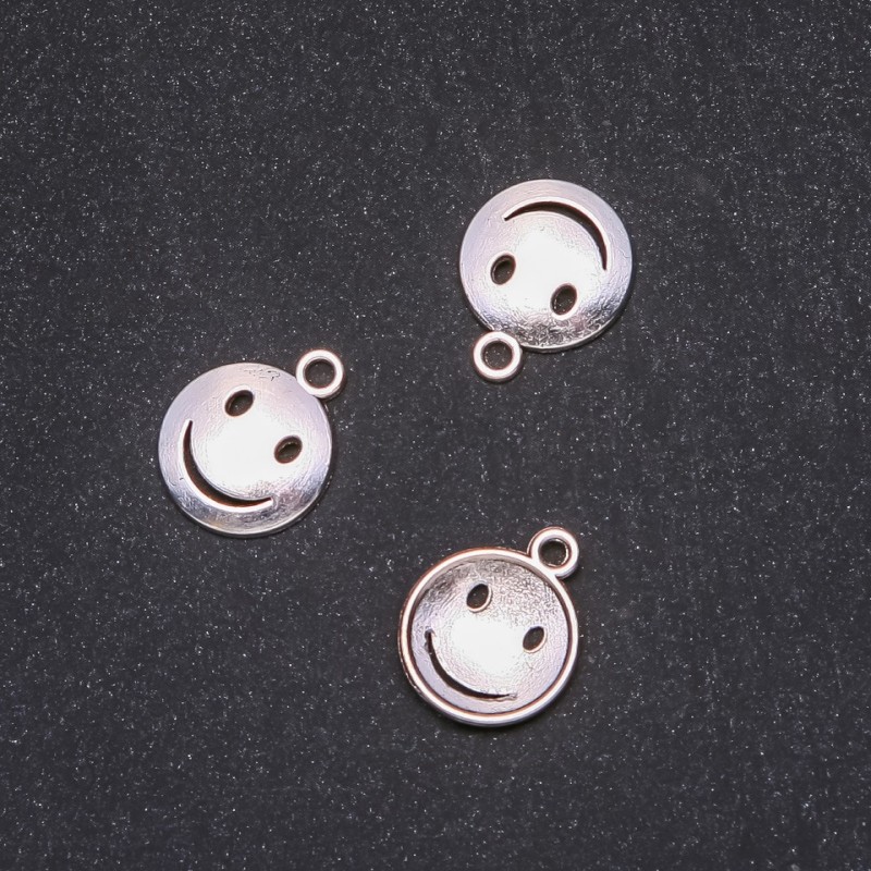 Pandantiv feronerie «Zâmbet» 15×18 mm, ambalare 20 g +/- 20 buc