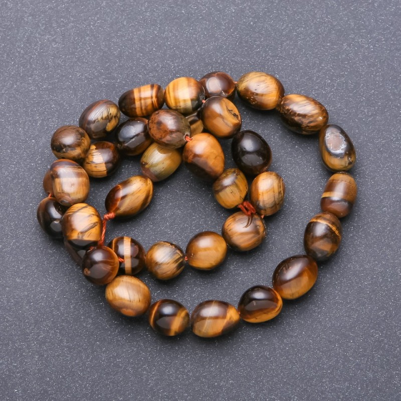 Mărgele pe șnur din piatră naturală — ochiul de tigru, fațetate, diametrul 9–12×8 mm, lungime 38 cm