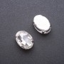 Prețul pentru pachet /10 bucăți. Cristal cusut în montură ovală 13×18 mm alb