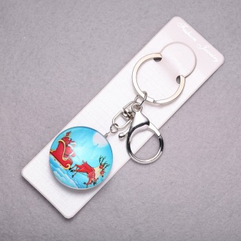 Breloc Anul Nou Moș Crăciun pe reni, lungime 10 cm