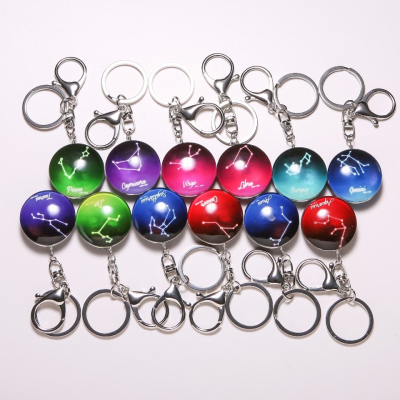 Brelocuri Zodiac cu efect fosforescent, set de 12 buc.