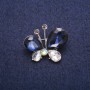 Broșă «Fluture» cu cristale, metal argintiu, 26×31 mm