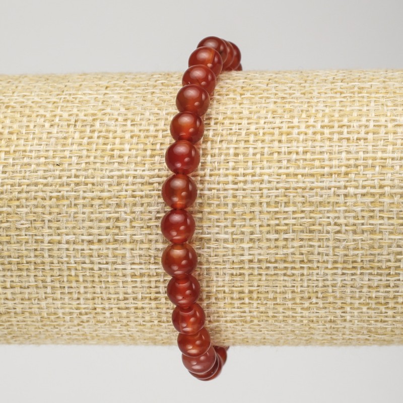 Brățară din carneol pe elastic, mărgele netede, diametru 6 mm, circumferința 18 cm