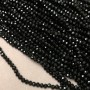 Mărgele din cristal ceh pe fir, negre mate, cu fațete rondel, diametrul 3,5x3 mm, lungimea 36-38 cm