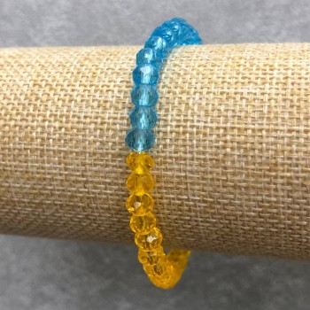 Brățară pe elastic din cristal ceh «Ucraina» cu rondel tăiat, diametrul 6x4 mm, lungime 18 cm