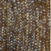 Mărgele din cristal ceh, pe fir, maro-transparent cu luciu de benzină, rondele tăiate, diametrul 8×6 mm, +/- lungime 38 cm +