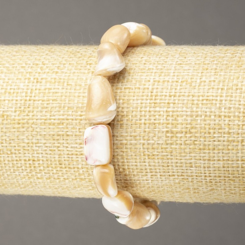 Brățară pe elastic din sidef natural bej, fațetate, diametru 17x9 mm