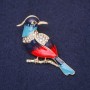 Broșă «Pasărea ibis» cu strasuri, culoare albastru deschis, albastru, roșu și alb, 45x25 mm, metal auriu